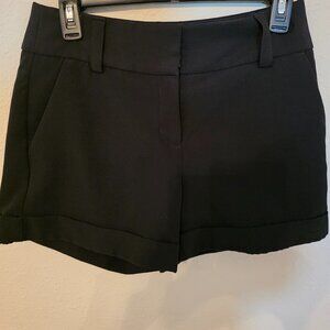 Express women's mid rise, black shorts, size 2.